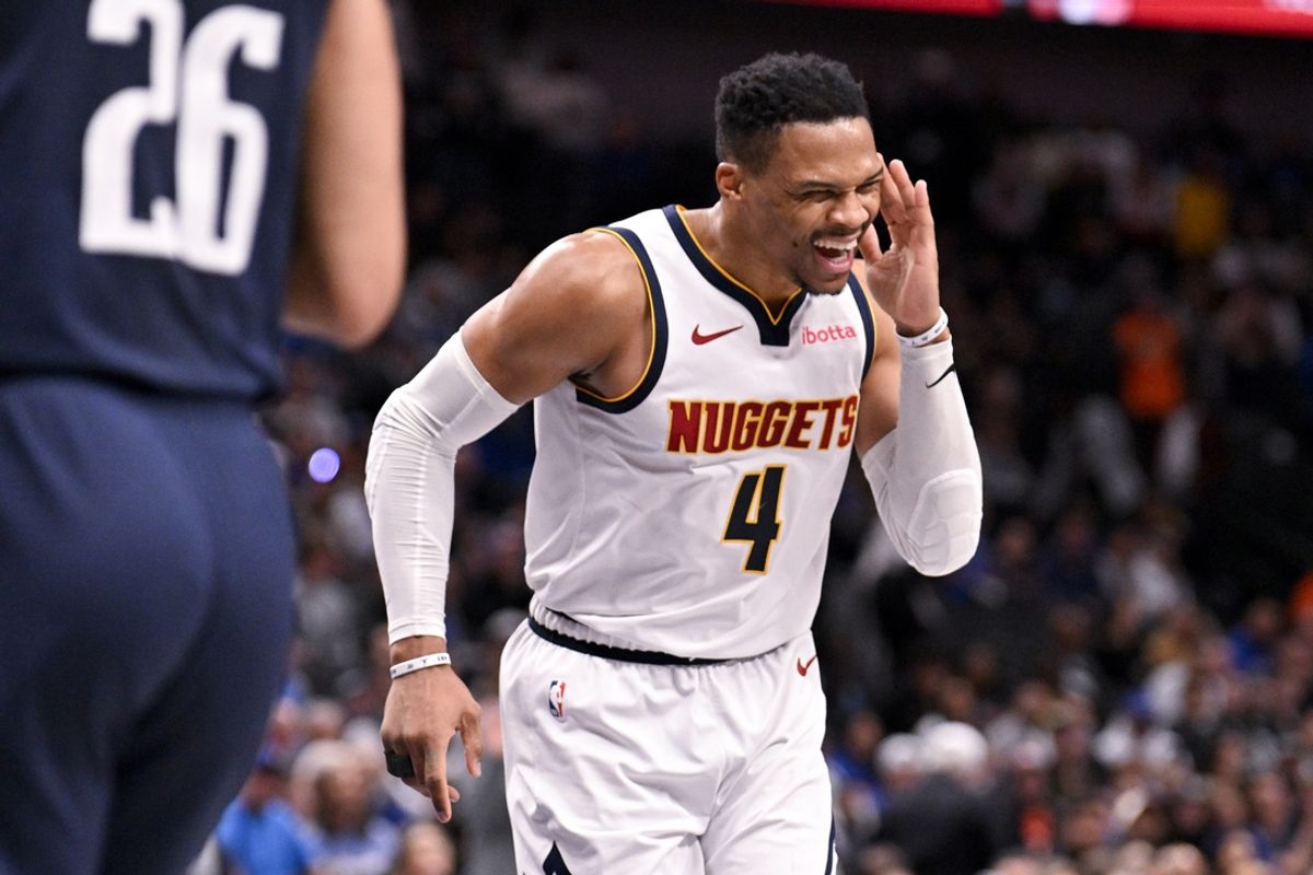 Jan 12, 2025; Dallas, Texas, USA; Denver Nuggets guard Russell Westbrook (4) motions to the Dallas Mavericks fans after he scores on a layup during the second half at the American Airlines Center. Mandatory Credit: Jerome Miron-Imagn Images