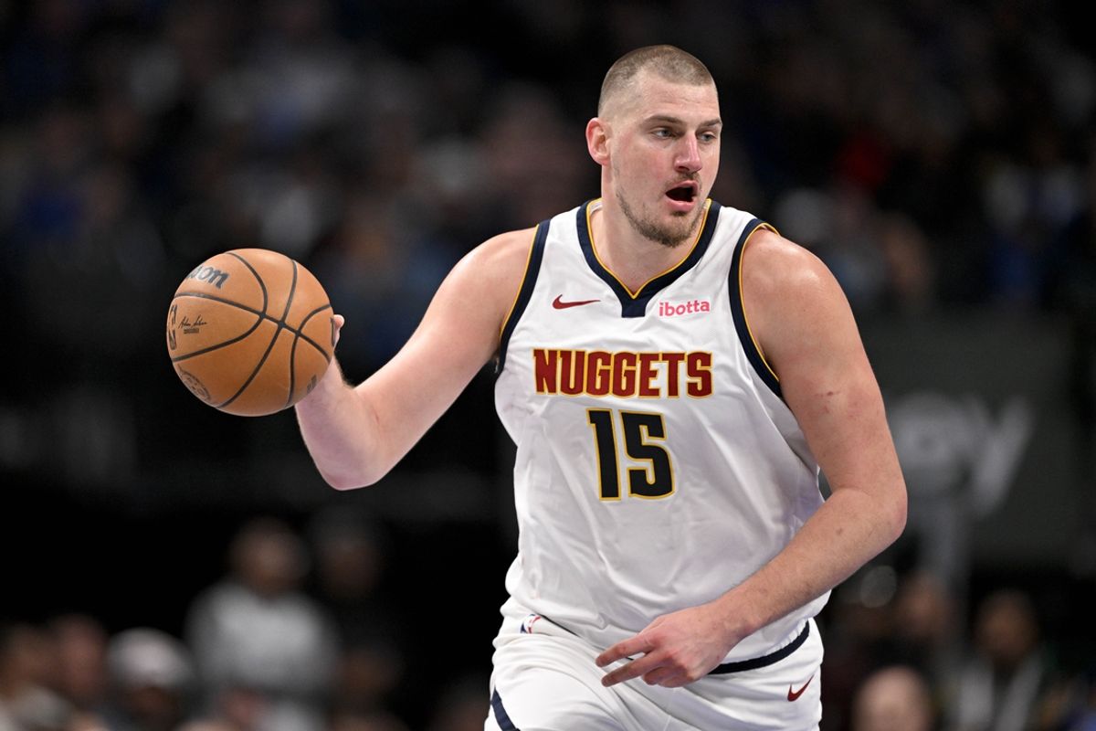 Jan 12, 2025; Dallas, Texas, USA; Denver Nuggets center Nikola Jokic (15) brings the ball up court against the Dallas Mavericks during the second half at the American Airlines Center. Mandatory Credit: Jerome Miron-Imagn Images