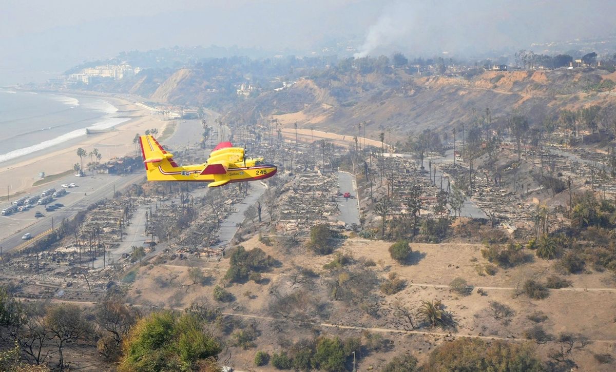January 9, 2025: Airplanes assist in firefighting above Pacific Palisades. The Palisades Fire ignited earlier and devastated the coastal community in Los Angeles County.