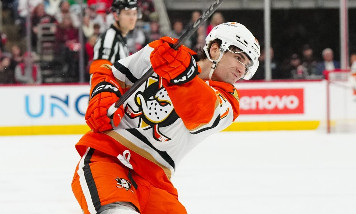 Jan 12, 2025; Raleigh, North Carolina, USA;  Anaheim Ducks left wing Cutter Gauthier (61) takes a shot against the Carolina Hurricanes during the second period at Lenovo Center. Mandatory Credit: James Guillory-Imagn Images