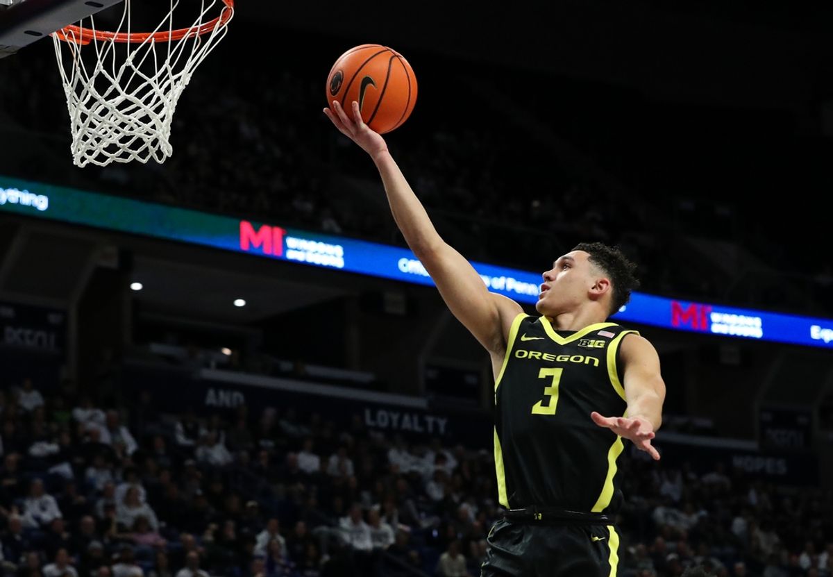 Jan 12, 2025; University Park, Pennsylvania, USA; Oregon Ducks guard Jackson Shelstad (3) drives the ball to the basket on a break away during the second half against the Penn State Nittany Lions at Bryce Jordan Center. Oregon defeated Penn State 82-81. Mandatory Credit: Matthew O'Haren-Imagn Images