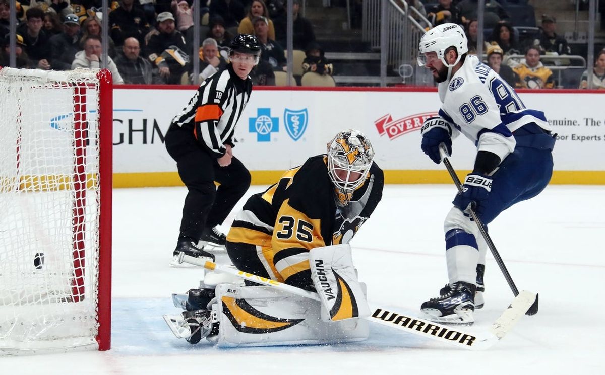 Jan 12, 2025; Pittsburgh, Pennsylvania, USA;  Tampa Bay Lightning right wing Nikita Kucherov (86) scores his second goal of the game against the Pittsburgh Penguins goaltender Tristan Jarry (35) during the third period at PPG Paints Arena. Mandatory Credit: Charles LeClaire-Imagn Images