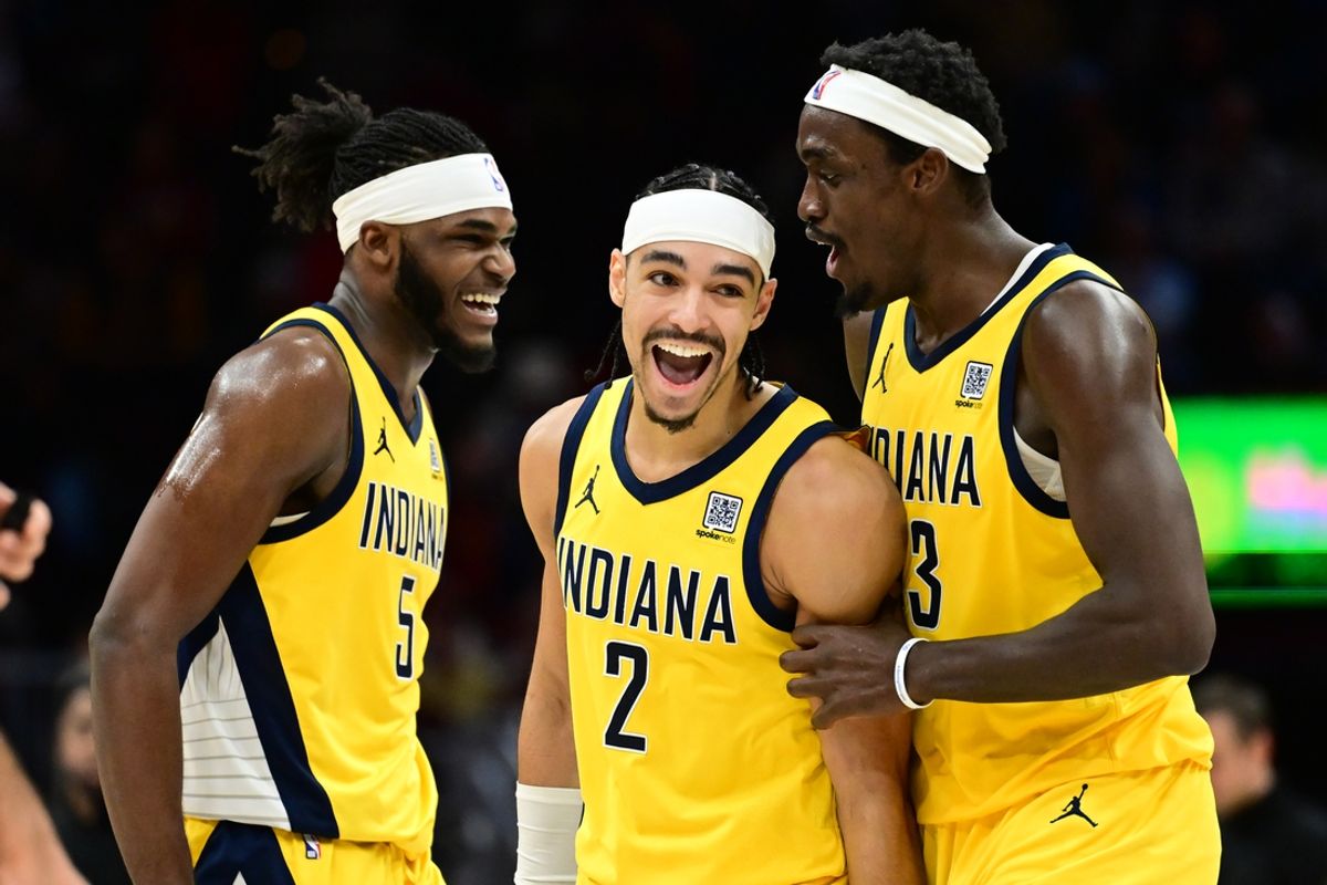 Jan 12, 2025; Cleveland, Ohio, USA; Indiana Pacers guard Andrew Nembhard (2) celebrates with forward Jarace Walker (5) and forward Pascal Siakam (43) after a basket during the second half against the Cleveland Cavaliers at Rocket Mortgage FieldHouse. Mandatory Credit: Ken Blaze-Imagn Images
