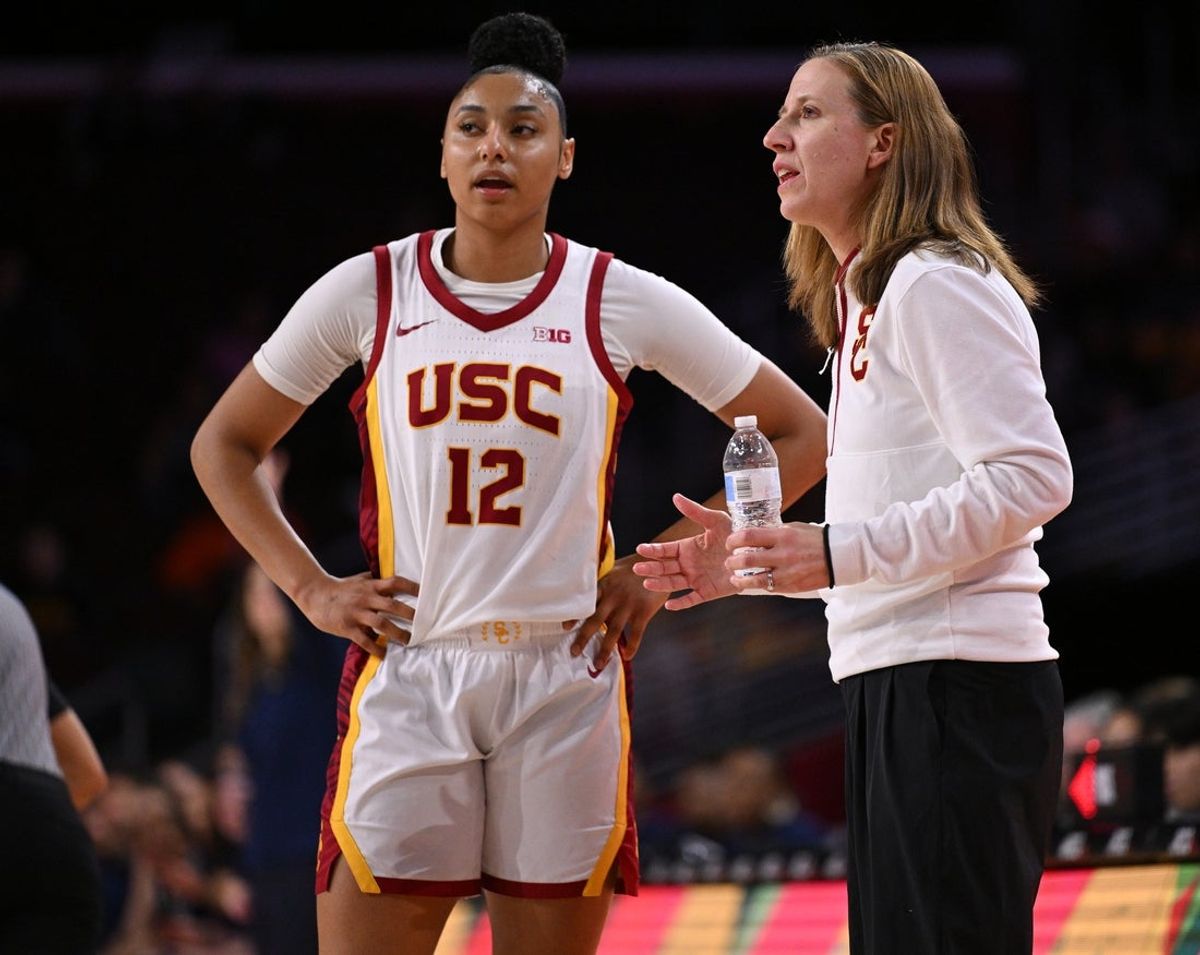 Jan 12, 2025; Los Angeles, California, USA; USC Trojans head coach Lindsay Gottlieb talks to guard JuJu Watkins (12) during the second quarter against the Penn State Nittany Lions at Galen Center. Mandatory Credit: Robert Hanashiro-Imagn Images