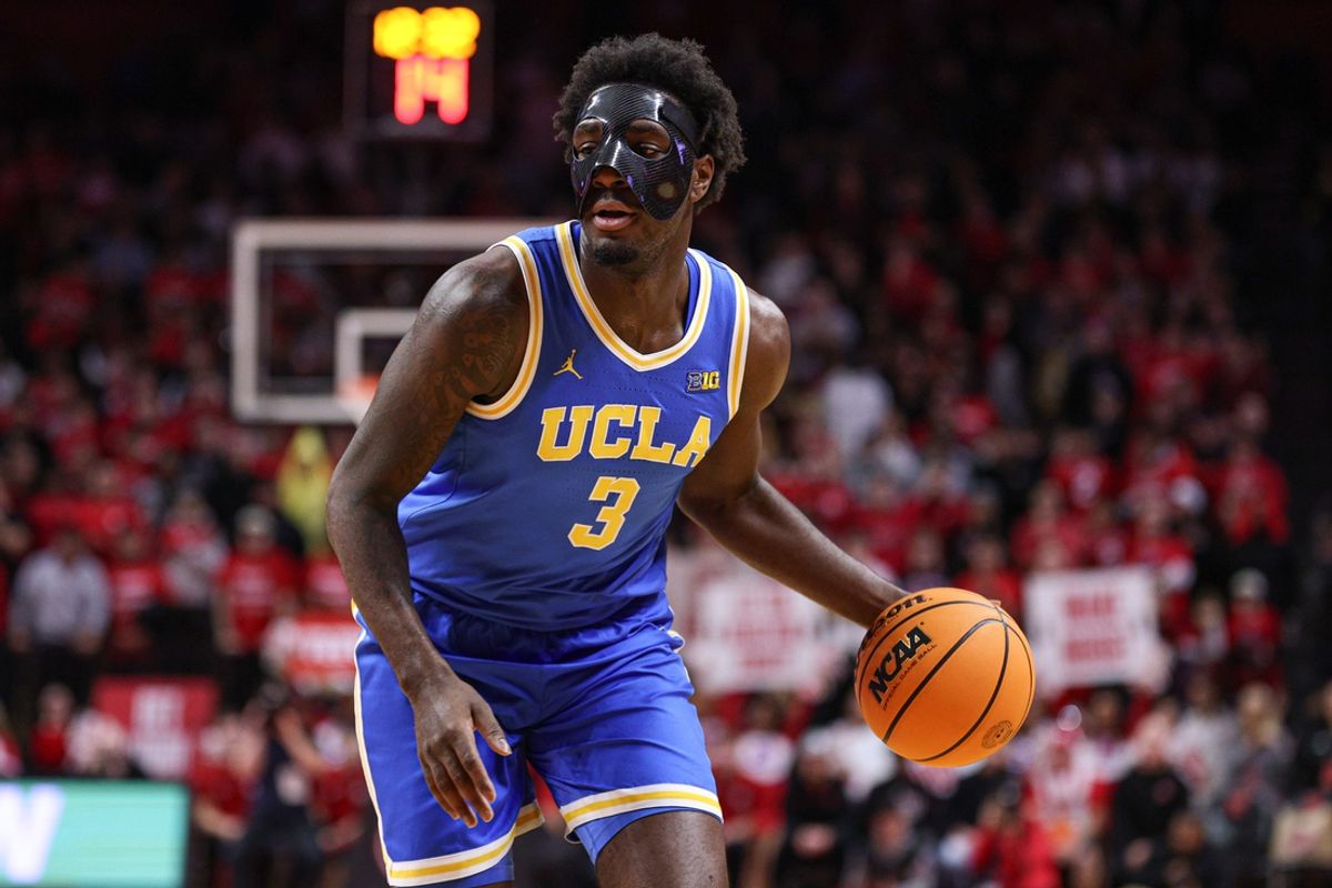 Jan 13, 2025; Piscataway, New Jersey, USA; UCLA Bruins guard Eric Dailey Jr. (3) dribbles during the first half against the Rutgers Scarlet Knights at Jersey Mike's Arena. Mandatory Credit: Vincent Carchietta-Imagn Images