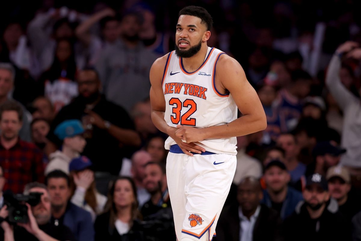 Jan 13, 2025; New York, New York, USA; New York Knicks center Karl-Anthony Towns (32) reacts during the third quarter against the Detroit Pistons at Madison Square Garden. Mandatory Credit: Brad Penner-Imagn Images