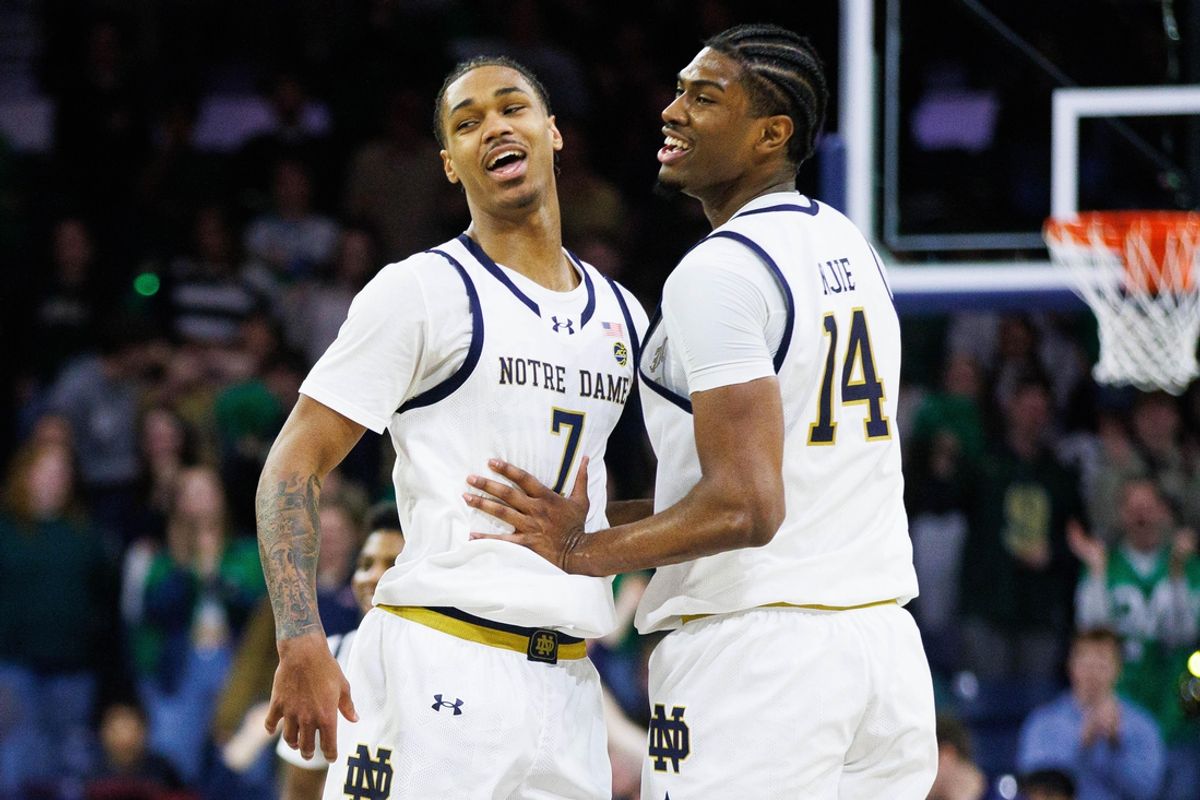 Notre Dame forward Tae Davis (7) and forward Kebba Njie (14) celebrate during a NCAA men's basketball game between Notre Dame and Boston College at Purcell Pavilion on Monday, Jan. 13, 2025, in South Bend.