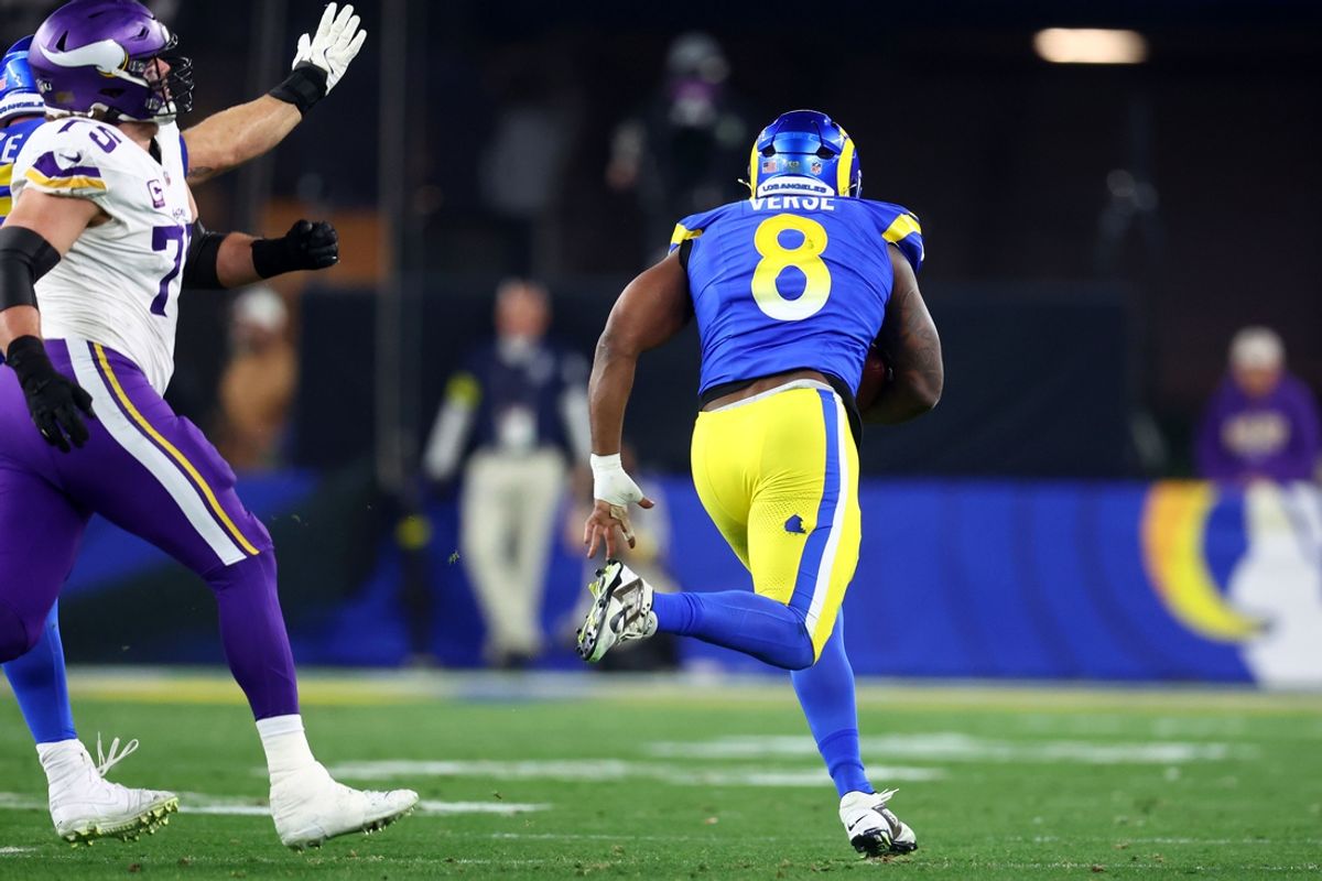 Jan 13, 2025; Glendale, AZ, USA; Los Angeles Rams linebacker Jared Verse (8) recovers a fumble against the Minnesota Vikings during the first half in an NFC wild card game at State Farm Stadium. Mandatory Credit: Mark J. Rebilas-Imagn Images