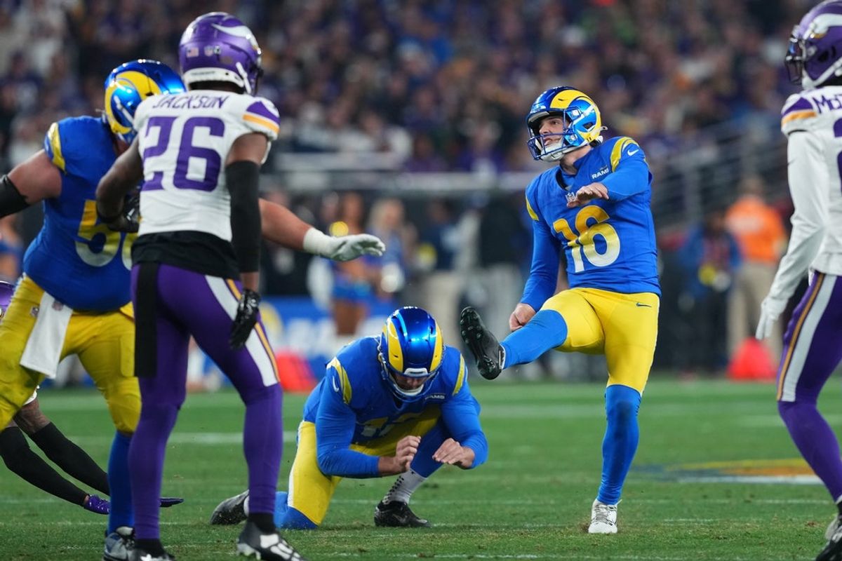 Jan 13, 2025; Glendale, AZ, USA; Los Angeles Rams place kicker Joshua Karty (16) kicks a field goal against the Minnesota Vikings during the second half in an NFC wild card game at State Farm Stadium. Mandatory Credit: Joe Camporeale-Imagn Images