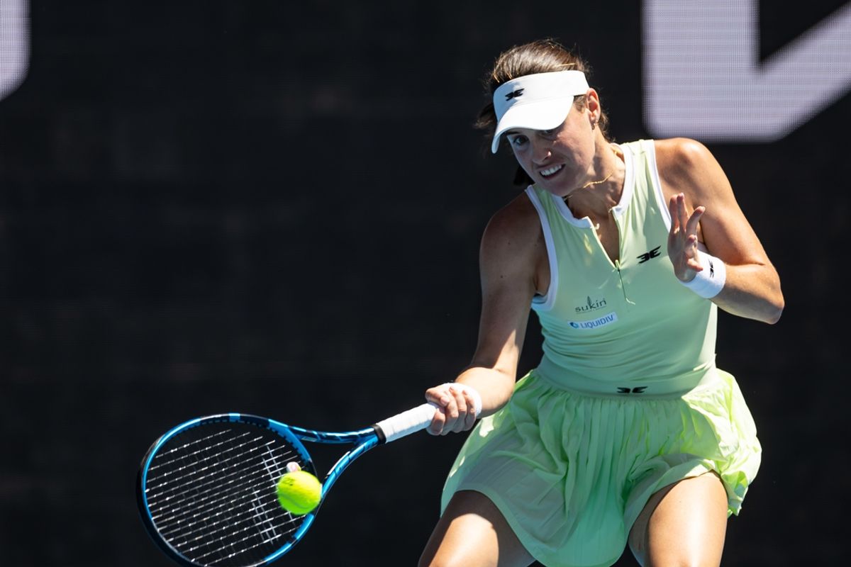 Jan 14, 2025; Melbourne, Victoria, Australia; Kimberly Birrell of Australia hits a forehand during her match against Eva Lys of Germany in the first round of the women's singles at the 2025 Australian Open at Melbourne Park. Mandatory Credit: Mike Frey-Imagn Images