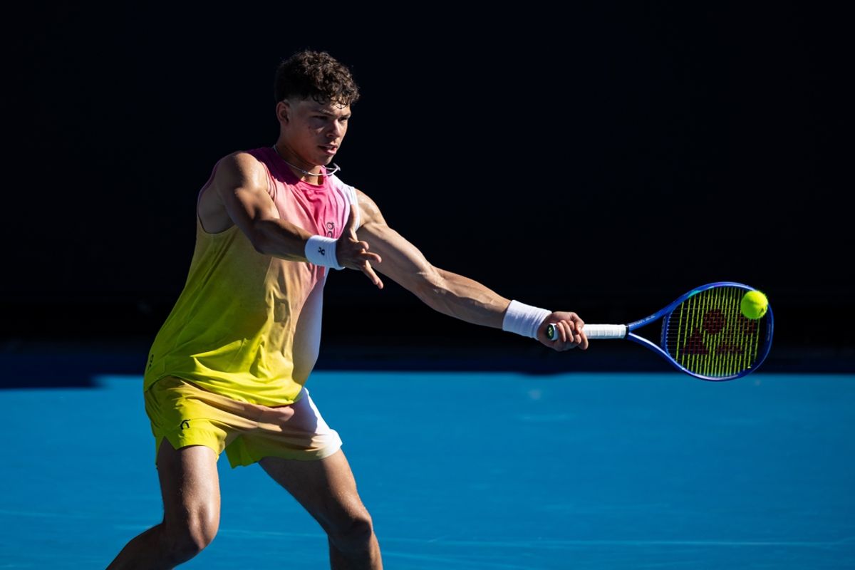 Jan 14, 2025; Melbourne, Victoria, Australia; Ben Shelton of United States of America hits a forehand during his match against Brandon Nakashima of United States of America in the first round of the men's singles at the 2025 Australian Open at Melbourne Park. Mandatory Credit: Mike Frey-Imagn Images