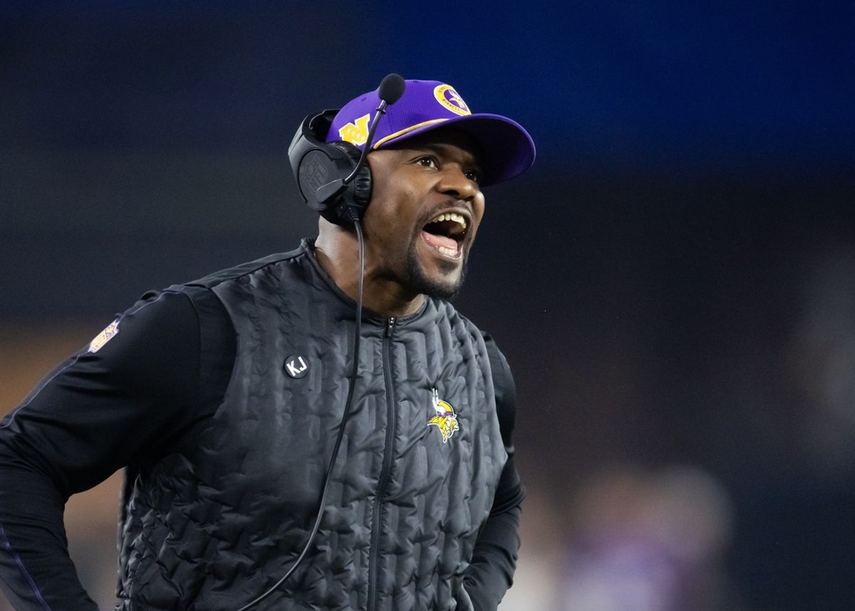 Jan 13, 2025; Glendale, AZ, USA; Minnesota Vikings defensive coordinator Brian Flores against the Los Angeles Rams during an NFC wild card game at State Farm Stadium. Mandatory Credit: Mark J. Rebilas-Imagn Images