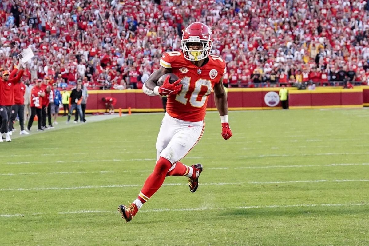 Oct 22, 2023; Kansas City, Missouri, USA; Kansas City Chiefs running back Isiah Pacheco (10) scores a touchdown against the Los Angeles Chargers during the second half at GEHA Field at Arrowhead Stadium.