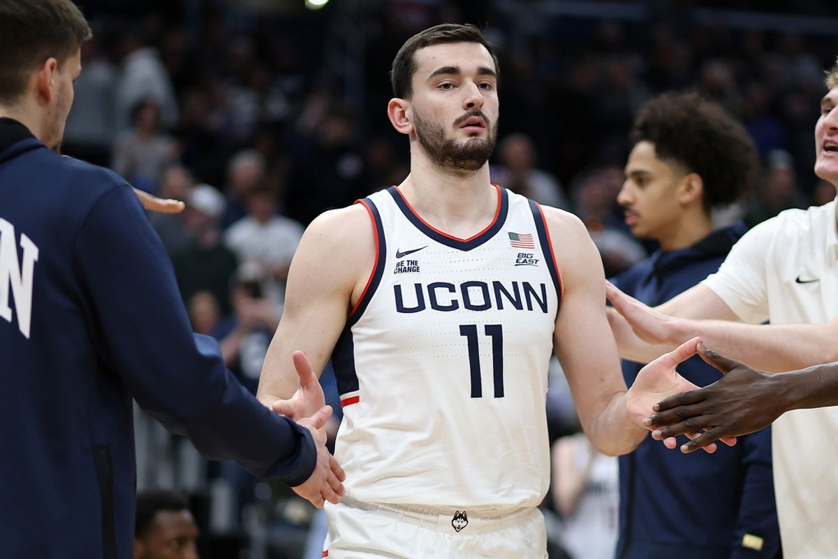 Jan 11, 2025; Washington, District of Columbia, USA; Connecticut Huskies forward Alex Karaban (11) is introduced before a game against the Georgetown Hoyas at Capital One Arena. Mandatory Credit: Daniel Kucin Jr.-Imagn Images