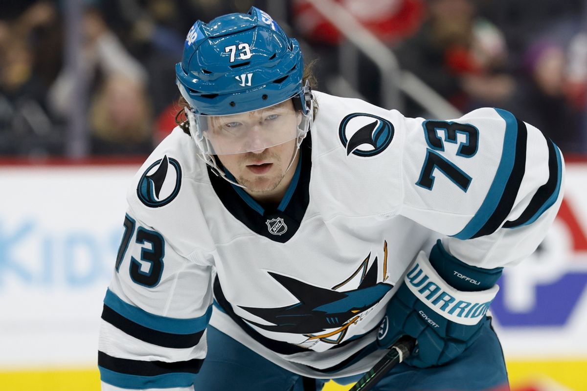 Jan 14, 2025; Detroit, Michigan, USA;  San Jose Sharks center Tyler Toffoli (73) gets set during a face off against the Detroit Red Wings in the first period at Little Caesars Arena. Mandatory Credit: Rick Osentoski-Imagn Images