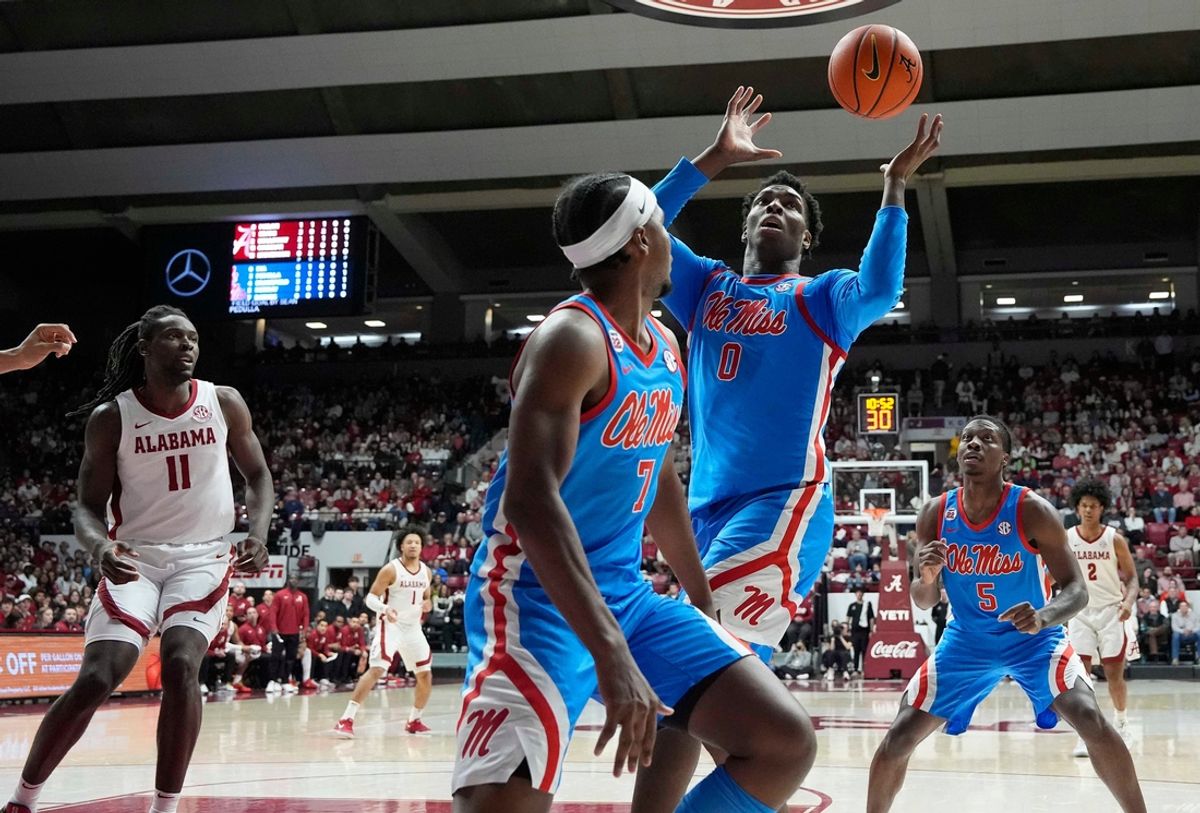 Jan 14, 2025; Tuscaloosa, AL, USA; Ole Miss forward Malik Dia (0) grabs a rebound against Alabama at Coleman Coliseum. Mandatory Credit: Gary Cosby Jr.-Tuscaloosa News