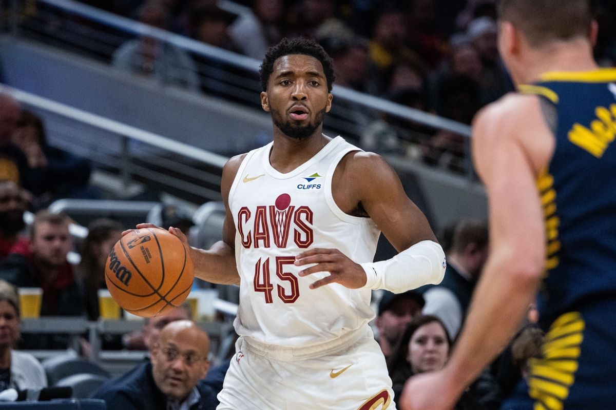 Jan 14, 2025; Indianapolis, Indiana, USA;  Cleveland Cavaliers guard Donovan Mitchell (45) dribble the ball in the first half against the Indiana Pacers  at Gainbridge Fieldhouse. Mandatory Credit: Trevor Ruszkowski-Imagn Images