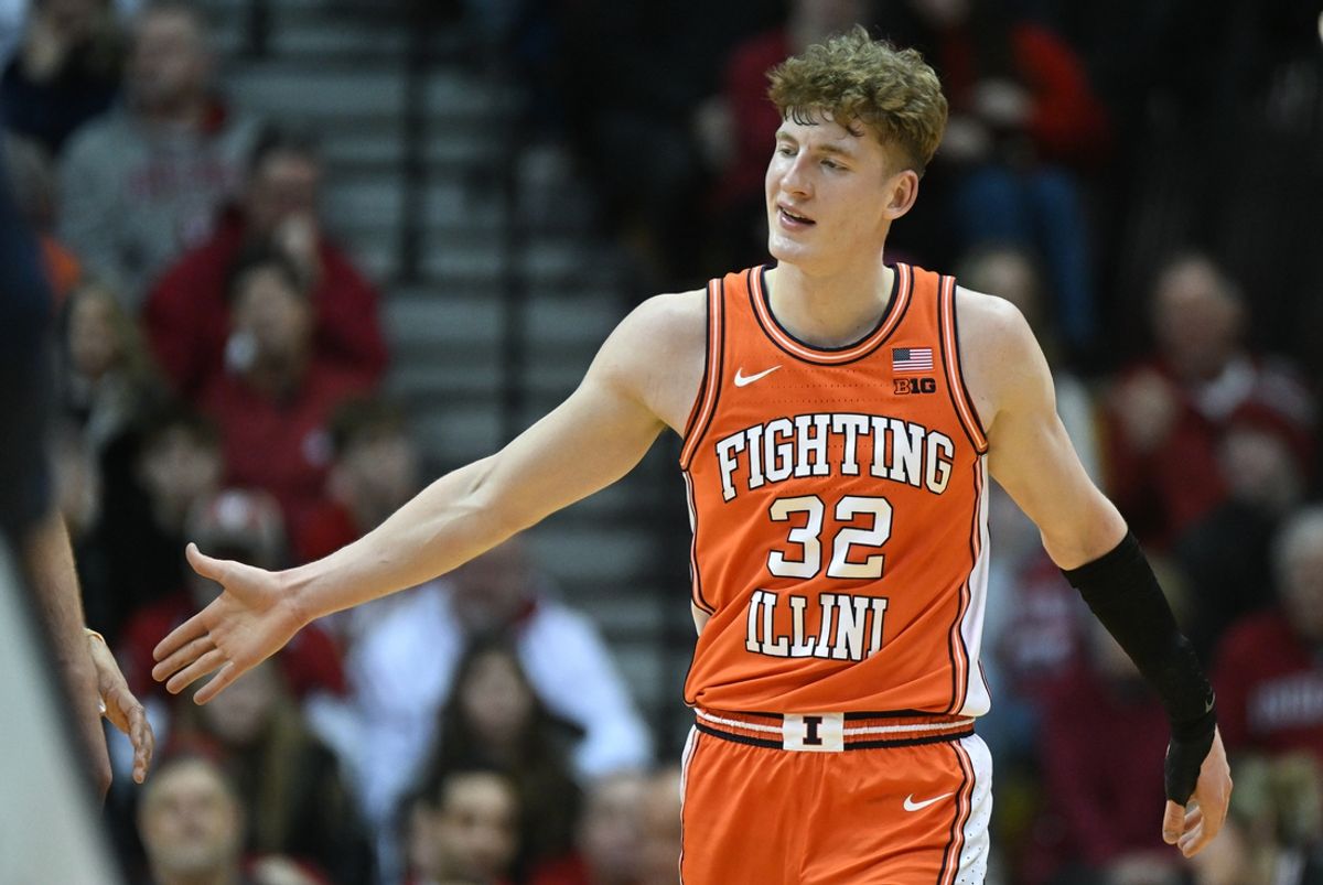 Jan 14, 2025; Bloomington, Indiana, USA; Illinois Fighting Illini guard Kasparas Jakucionis (32) celebrates after a play during the first half against the Indiana Hoosiers at Simon Skjodt Assembly Hall. Mandatory Credit: Robert Goddin-Imagn Images