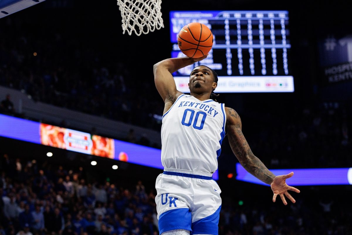 Jan 14, 2025; Lexington, Kentucky, USA; Kentucky Wildcats guard Otega Oweh (00) goes up for a dunk during the second half against the Texas A&M Aggies at Rupp Arena at Central Bank Center. Mandatory Credit: Jordan Prather-Imagn Images