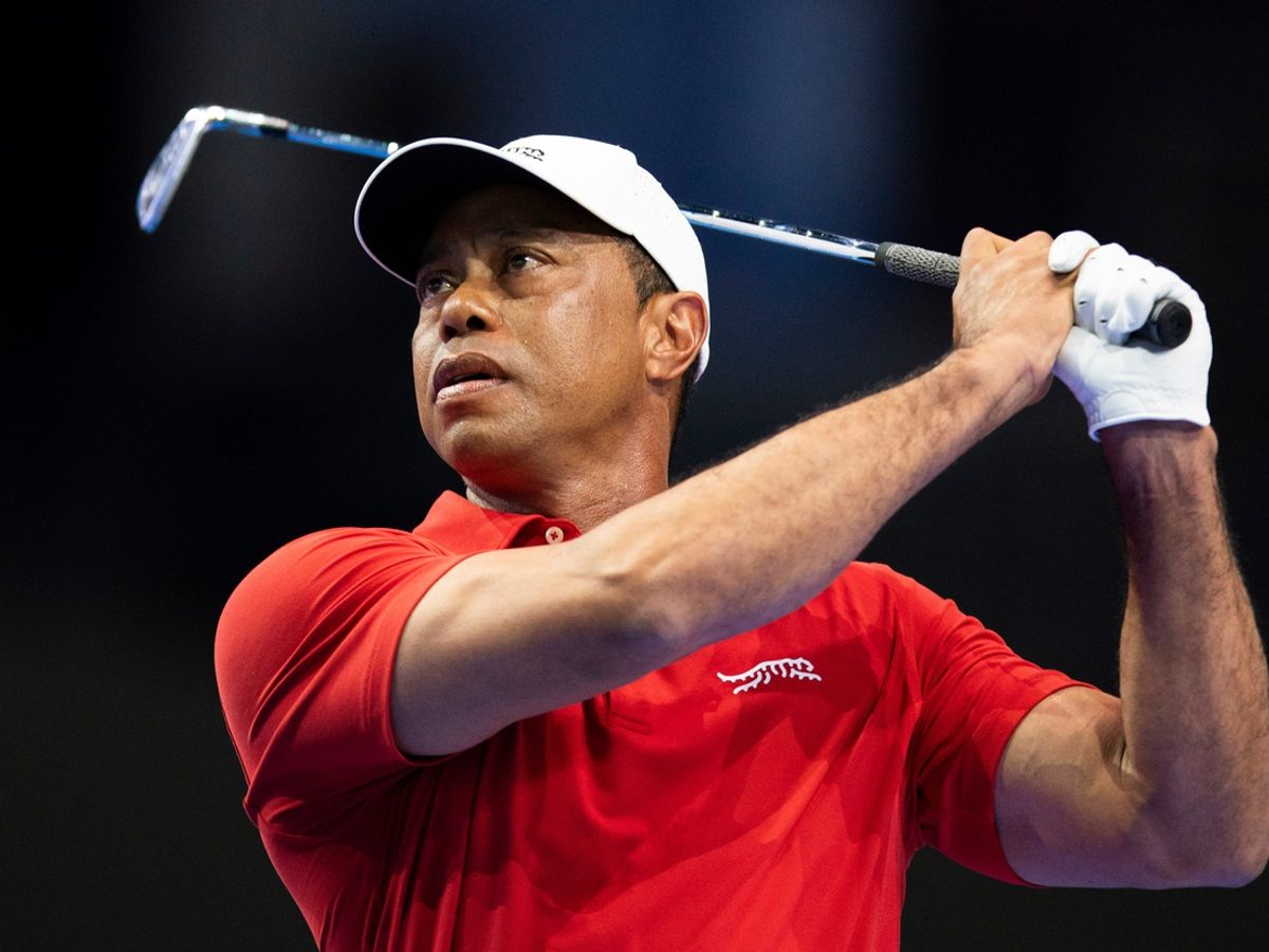 Golfer Tiger Woods warms up at SoFi Center before golf match between Jupiter Links and Los Angeles Golf Club in the TGL, interactive golf league founded by Woods and Rory McIlroy on January 14, 2025 in Palm Beach Gardens, Florida.
