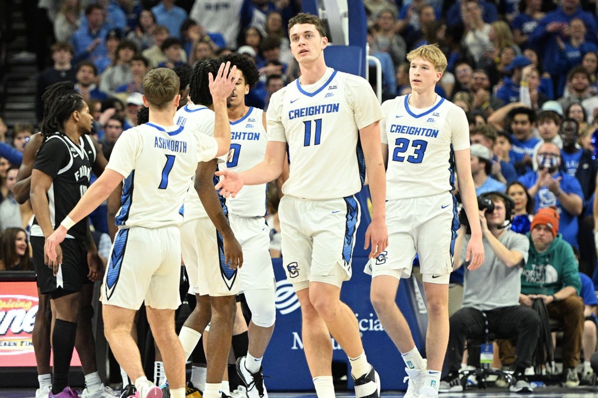 Jan 14, 2025; Omaha, Nebraska, USA;  Creighton Bluejays guard Steven Ashworth (1) congratulates center Ryan Kalkbrenner (11) after a basket against the Providence Friars during the first half at CHI Health Center Omaha. Mandatory Credit: Steven Branscombe-Imagn Images