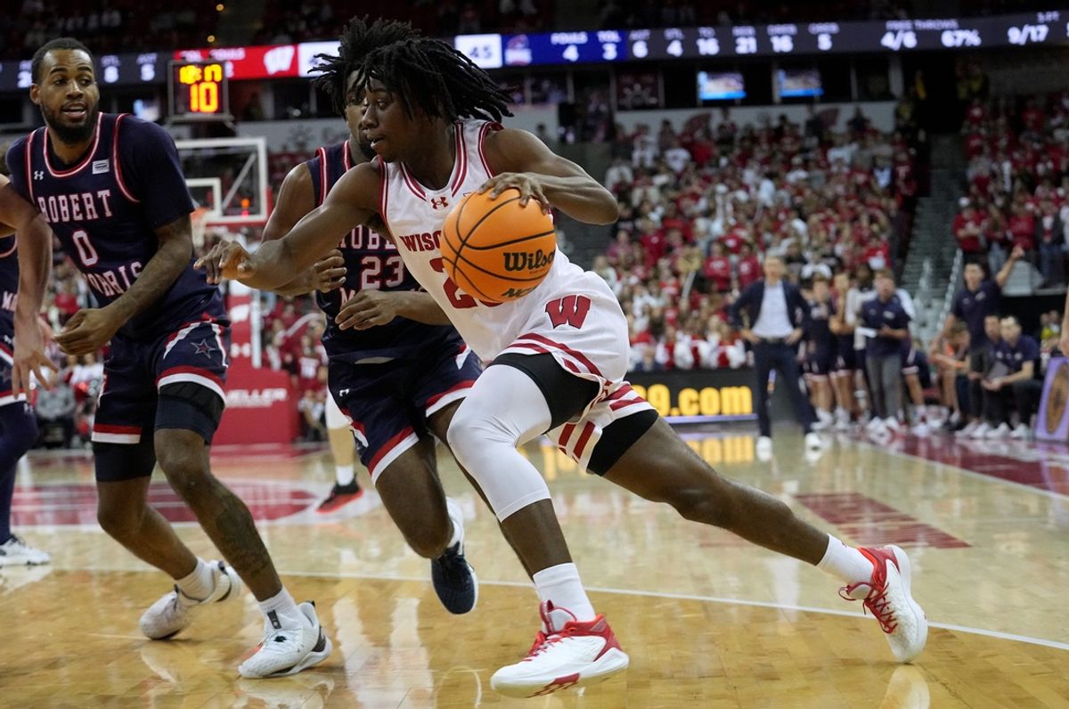 Wisconsin guard John Blackwell (25) drive along the baseline during the second half of their game Friday, November 17, 2023, at the Kohl Center in Madison, Wisconsin. Wisconsin beat Robert Morris 78-68.