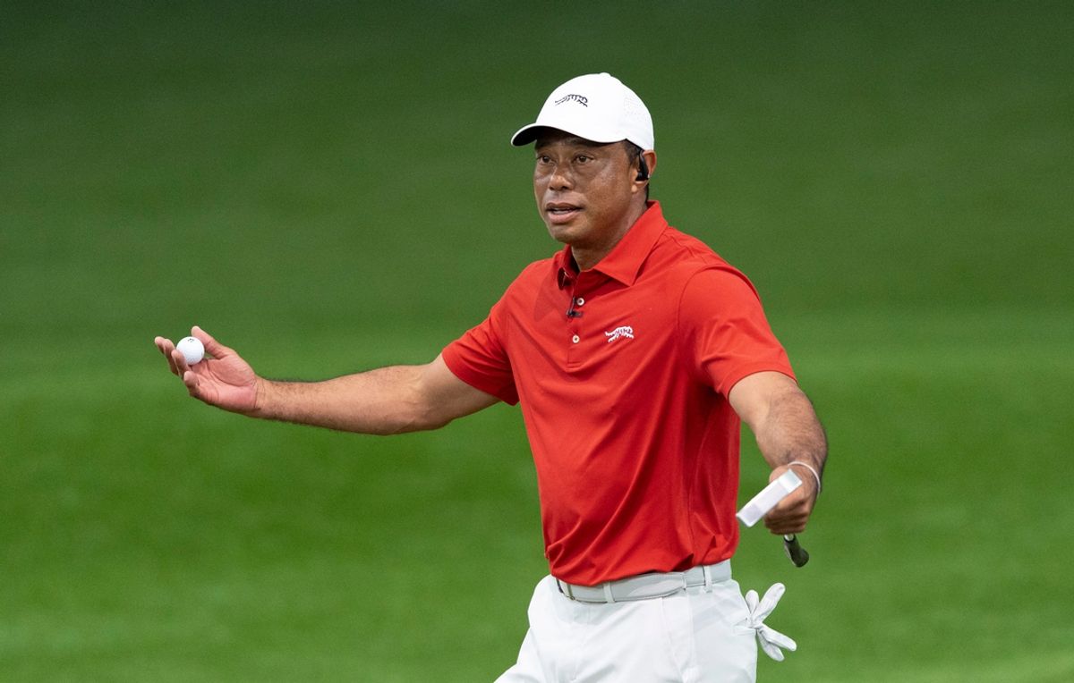 Golfer Tiger Woods encourages the fans at SoFi Center during a golf match between Jupiter Links Golf Club and Los Angeles Golf Club in the TGL, the interactive golf league founded by Tiger Woods and Rory McIlroy on January 14, 2025 at Palm Beach State College in Palm Beach Gardens, Florida.