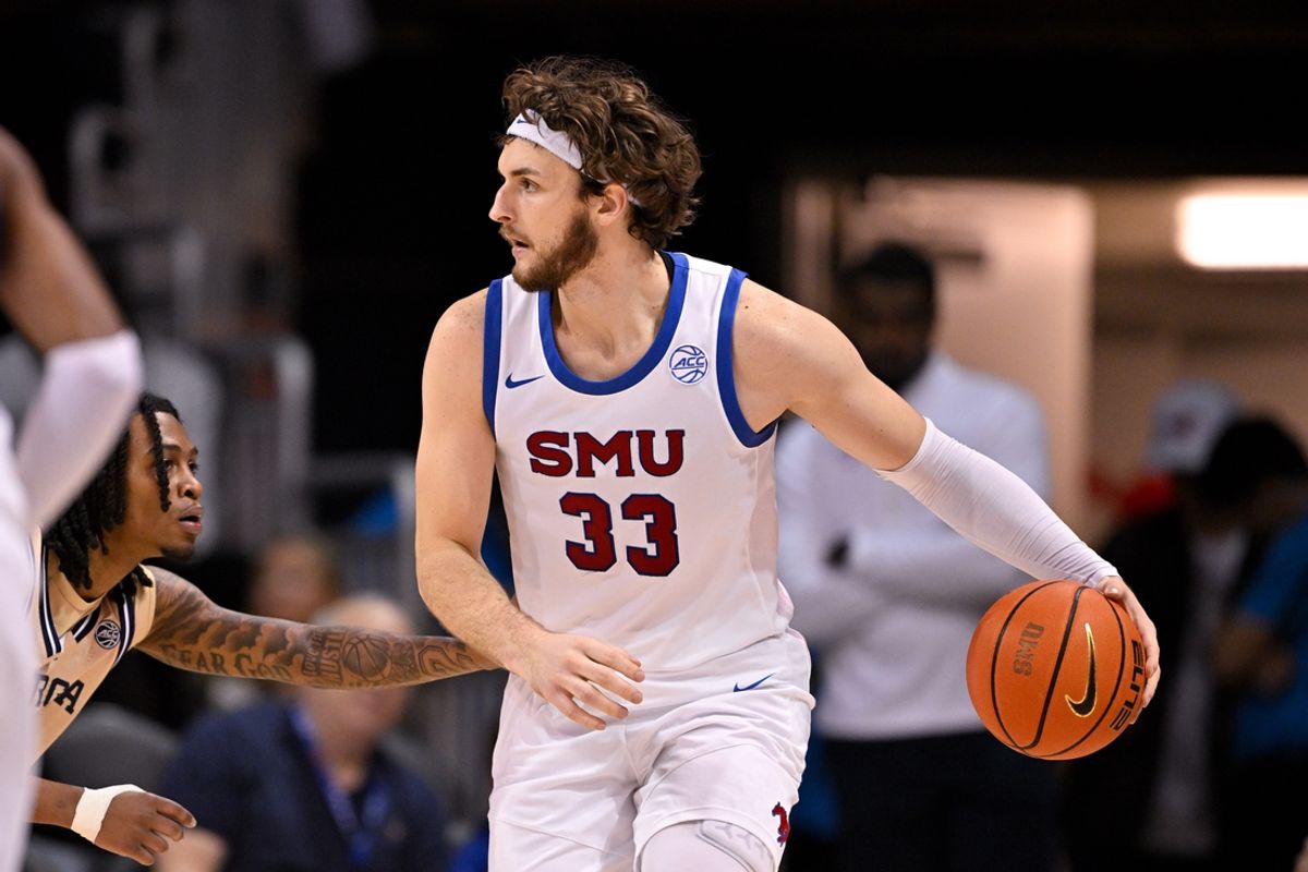 Jan 11, 2025; Dallas, Texas, USA; SMU Mustangs forward Matt Cross (33) in action during the game between the SMU Mustangs and the Georgia Tech Yellow Jackets at Moody Coliseum. Mandatory Credit: Jerome Miron-Imagn Images