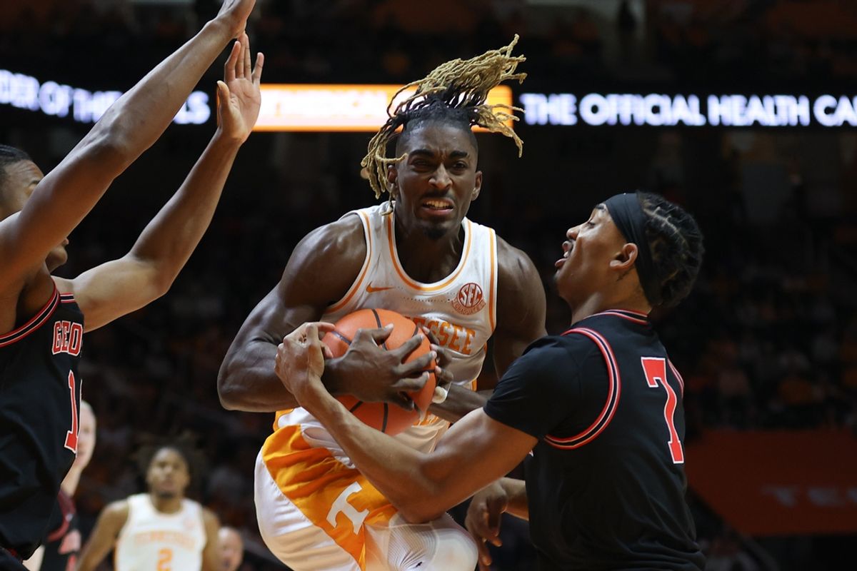 Jan 15, 2025; Knoxville, Tennessee, USA; Tennessee Volunteers guard Jahmai Mashack (15) drives against Georgia Bulldogs guard Tyrin Lawrence (7) during the first half at Thompson-Boling Arena at Food City Center. Mandatory Credit: Randy Sartin-Imagn Images
