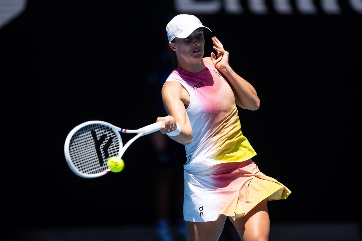 Jan 16, 2025; Melbourne, Victoria, Australia; Iga Swiatek of Poland hits a forehand during her match against Rebecca Sramkova of Slovakia in the second round of the women's singles at the 2025 Australian Open at Melbourne Park. Mandatory Credit: Mike Frey-Imagn Images