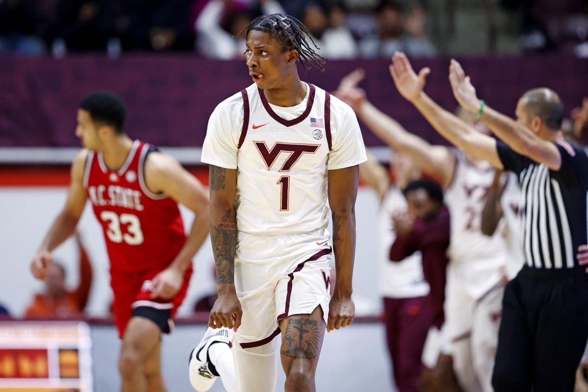Jan 15, 2025; Blacksburg, Virginia, USA; Virginia Tech Hokies forward Tobi Lawal (1) celebrate after making a three pointer during the second half against the North Carolina State Wolfpack at Cassell Coliseum. Mandatory Credit: Peter Casey-Imagn Images