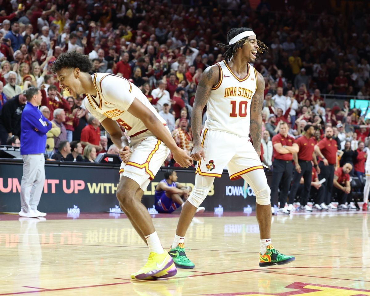 Jan 15, 2025; Ames, Iowa, USA;  Iowa State Cyclones guard Curtis Jones (5) and Iowa State Cyclones guard Keshon Gilbert (10) celebrate in their game with the Kansas Jayhawks during the second half at James H. Hilton Coliseum. Mandatory Credit: Reese Strickland-Imagn Images