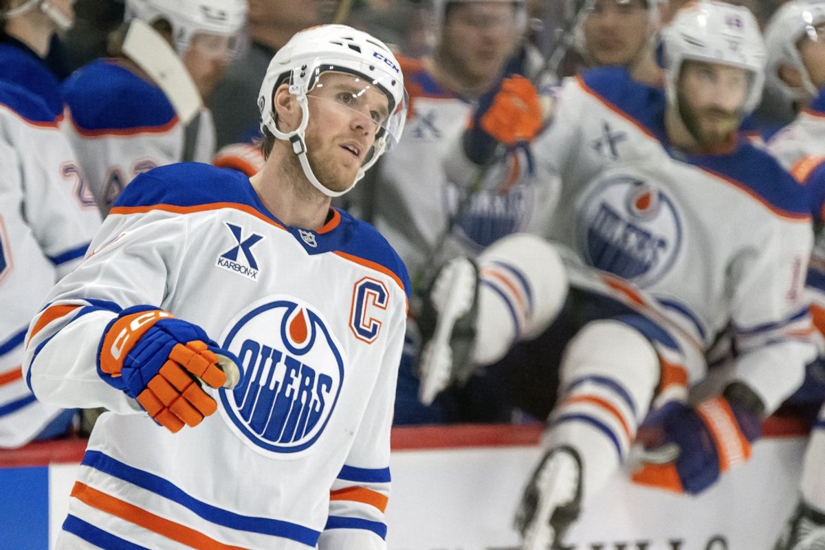 Jan 15, 2025; Saint Paul, Minnesota, USA;  Edmonton Oilers forward Connor McDavid (97) celebrates his power play goal against the Minnesota Wild during the first period at Xcel Energy Center. Mandatory Credit: Nick Wosika-Imagn Images