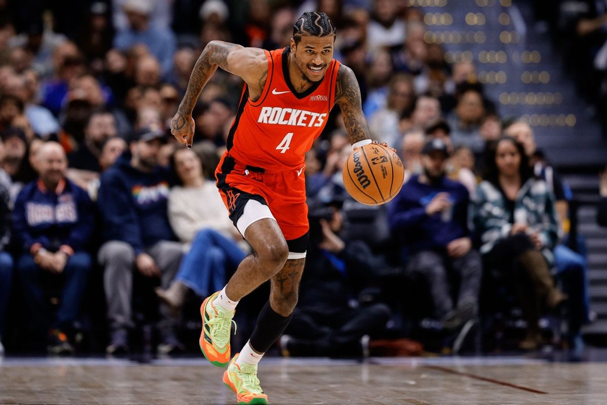 Jan 15, 2025; Denver, Colorado, USA; Houston Rockets guard Jalen Green (4) dribbles the ball up court in the second quarter against the Denver Nuggets at Ball Arena. Mandatory Credit: Isaiah J. Downing-Imagn Images
