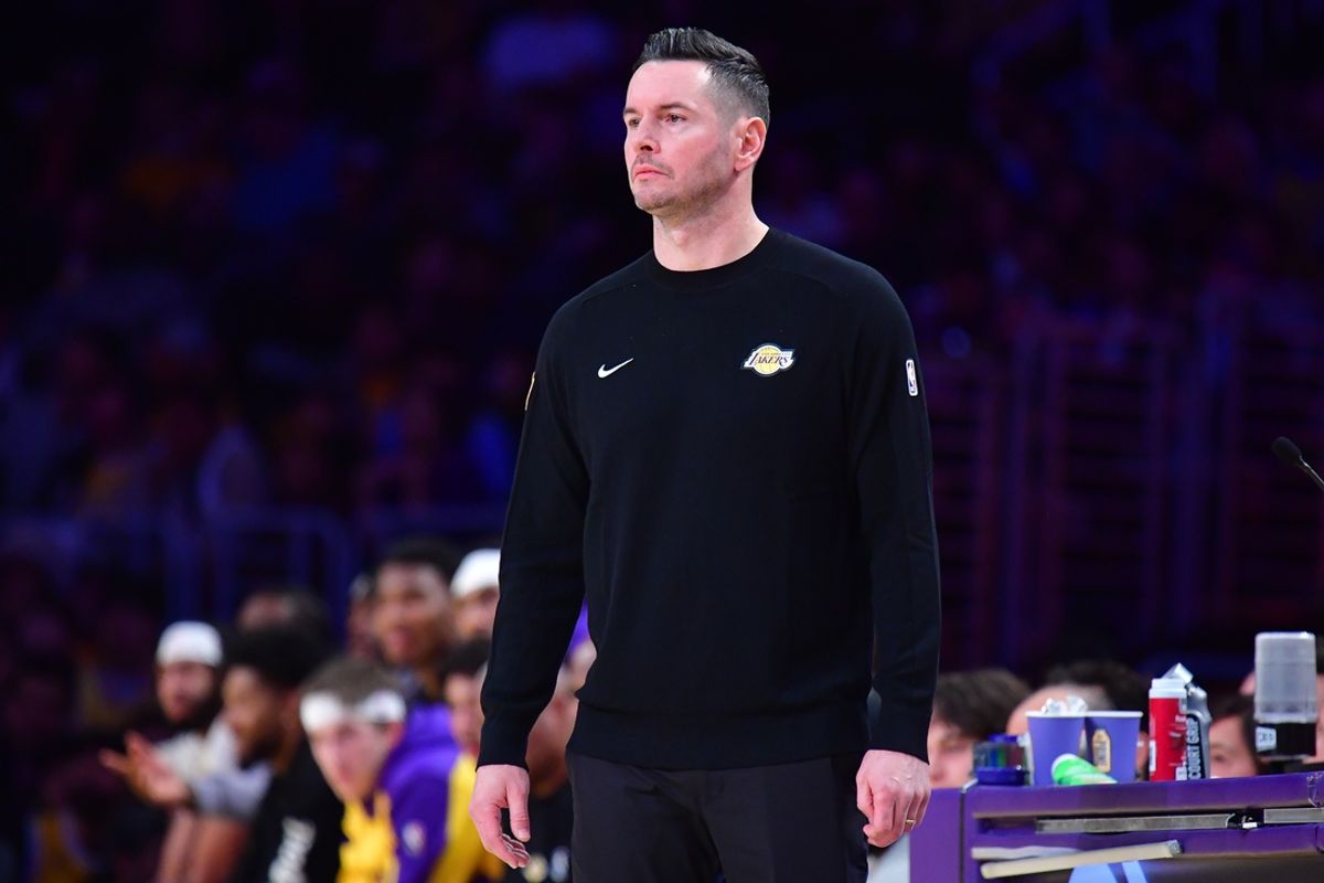 January 15, 2025; Los Angeles, California, USA; Los Angeles Lakers head coach JJ Redick watches game action against the Miami Heat during the first half at Crypto.com Arena. Mandatory Credit: Gary A. Vasquez-Imagn Images