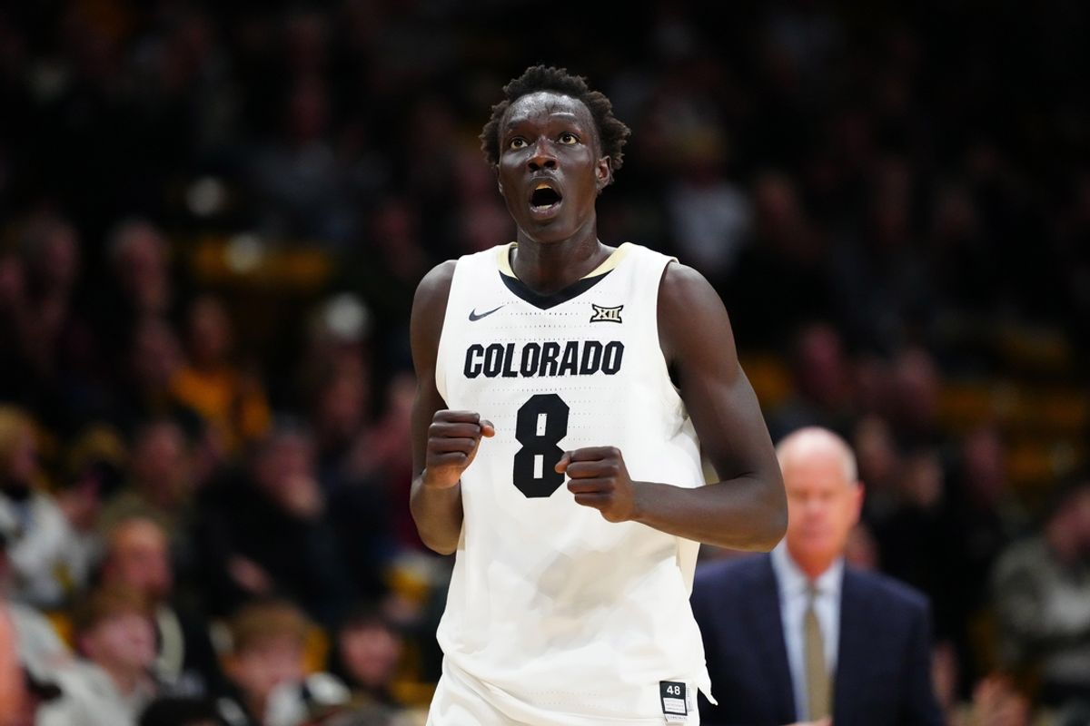 Jan 15, 2025; Boulder, Colorado, USA; Colorado Buffaloes forward Bangot Dak (8) reacts in the second half against the Cincinnati Bearcats at the CU Events Center. Mandatory Credit: Ron Chenoy-Imagn Images