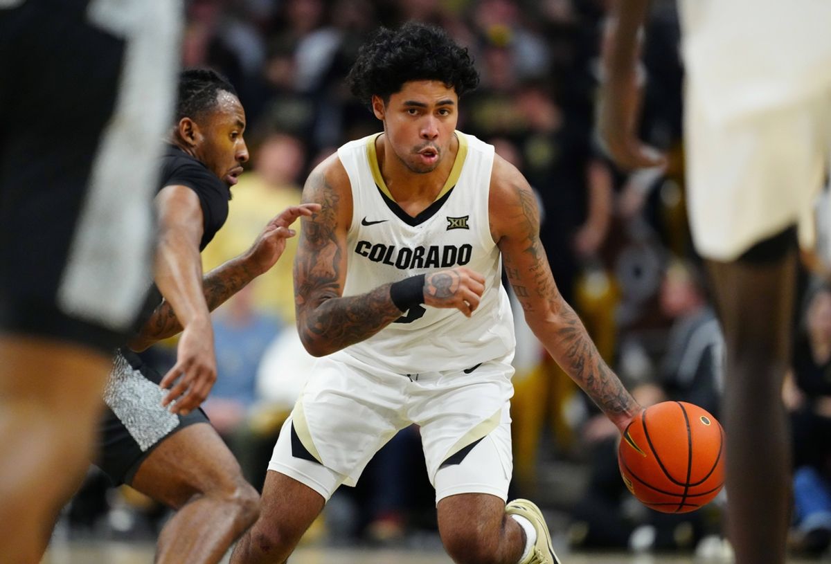Jan 15, 2025; Boulder, Colorado, USA; Colorado Buffaloes guard Julian Hammond III (3) controls the ball in the second half against the Cincinnati Bearcats at the CU Events Center. Mandatory Credit: Ron Chenoy-Imagn Images