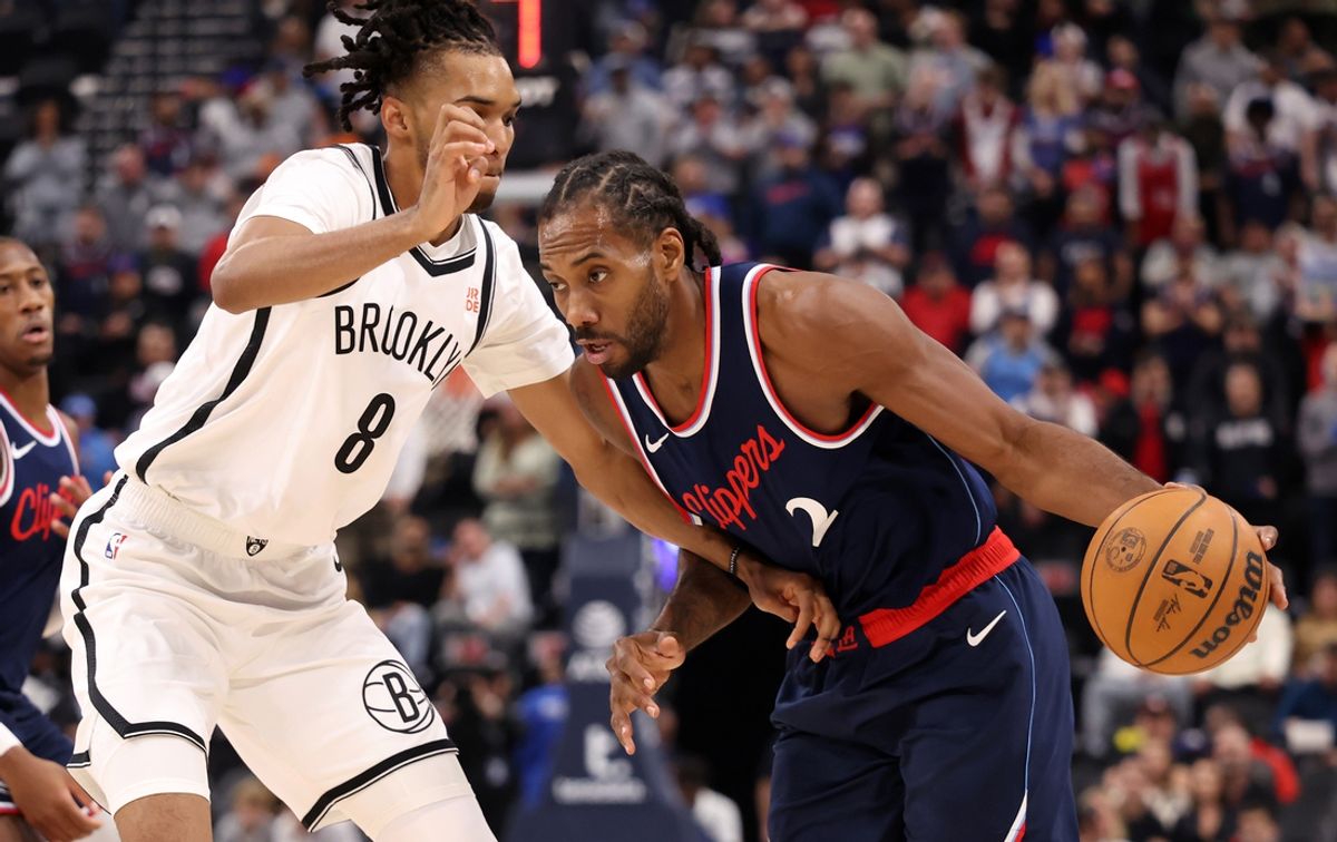 Jan 15, 2025; Inglewood, California, USA;  LA Clippers forward Kawhi Leonard (2) dribbles against Brooklyn Nets forward Ziaire Williams (8) during the first half at Intuit Dome. Mandatory Credit: Kiyoshi Mio-Imagn Images
