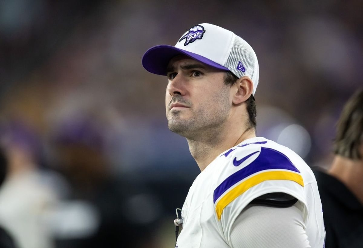 Jan 13, 2025; Glendale, AZ, USA; Minnesota Vikings quarterback Daniel Jones (13) against the Los Angeles Rams during an NFC wild card game at State Farm Stadium. Mandatory Credit: Mark J. Rebilas-Imagn Images