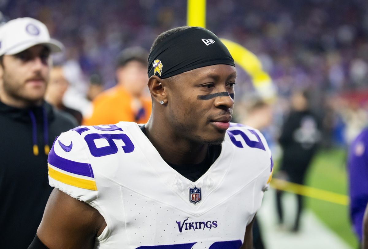 Jan 13, 2025; Glendale, AZ, USA; Minnesota Vikings safety Theo Jackson (26) against the Los Angeles Rams during an NFC wild card game at State Farm Stadium. Mandatory Credit: Mark J. Rebilas-Imagn Images