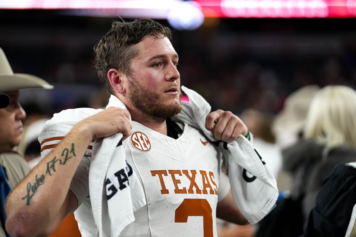 Texas Longhorns quarterback Quinn Ewers (3) looks into the crowd after the 28-14 loss to Ohio State in the College Football Playoff semifinal game in the Cotton Bowl at AT&T Stadium on Friday, Jan. 10, 2024 in Arlington, Texas.