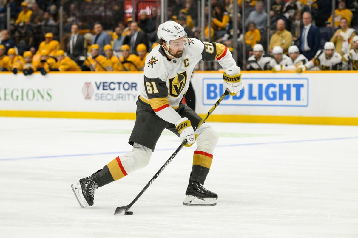 Jan 14, 2025; Nashville, Tennessee, USA;  Vegas Golden Knights right wing Mark Stone (61) takes a shot on goal against the Nashville Predators during the second period at Bridgestone Arena. Mandatory Credit: Steve Roberts-Imagn Images