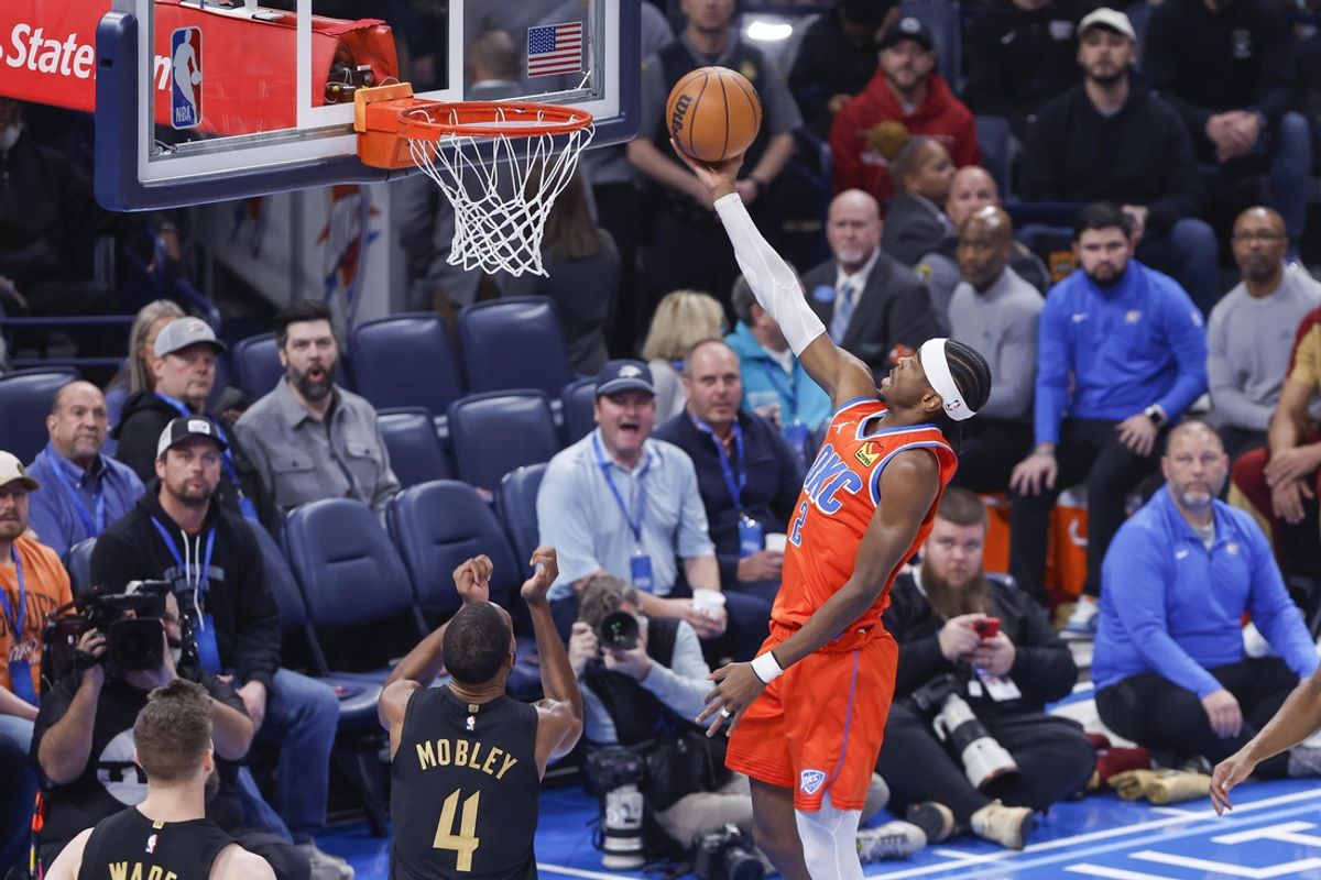 Jan 16, 2025; Oklahoma City, Oklahoma, USA; Oklahoma City Thunder guard Shai Gilgeous-Alexander (2) goes to the basket against the Cleveland Cavaliers during the first quarter at Paycom Center. Mandatory Credit: Alonzo Adams-Imagn Images