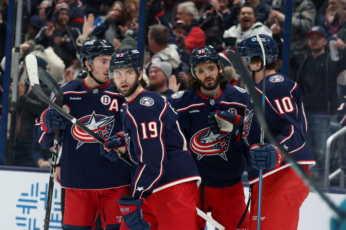 Jan 16, 2025; Columbus, Ohio, USA;   Columbus Blue Jackets center Adam Fantilli (19) celebrates his goal with  right wing Kirill Marchenko (86) and left wing Dmitri Voronkov (10) and defenseman Zach Werenski (8) during the first period against the San Jose Sharks at Nationwide Arena. Mandatory Credit: Joseph Maiorana-Imagn Images
