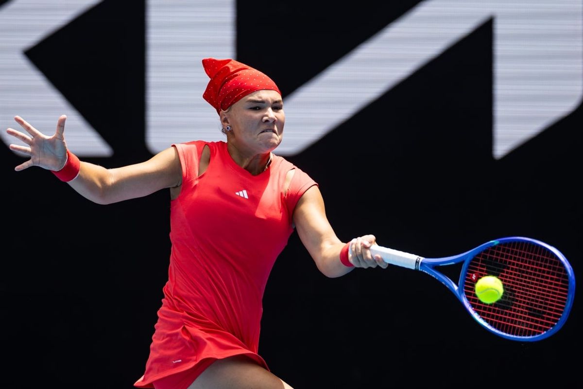 Jan 17, 2025; Melbourne, Victoria, Australia; Diana Shnaider hits a forehand during her match against Donna Vekic of Croatia in the third round of the women's singles at the 2025 Australian Open at Melbourne Park. Mandatory Credit: Mike Frey-Imagn Images