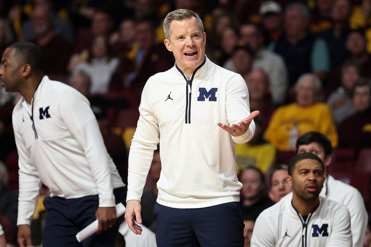 Jan 16, 2025; Minneapolis, Minnesota, USA; Michigan Wolverines head coach Dusty May reacts during overtime against the Minnesota Golden Gophers at Williams Arena. Mandatory Credit: Matt Krohn-Imagn Images