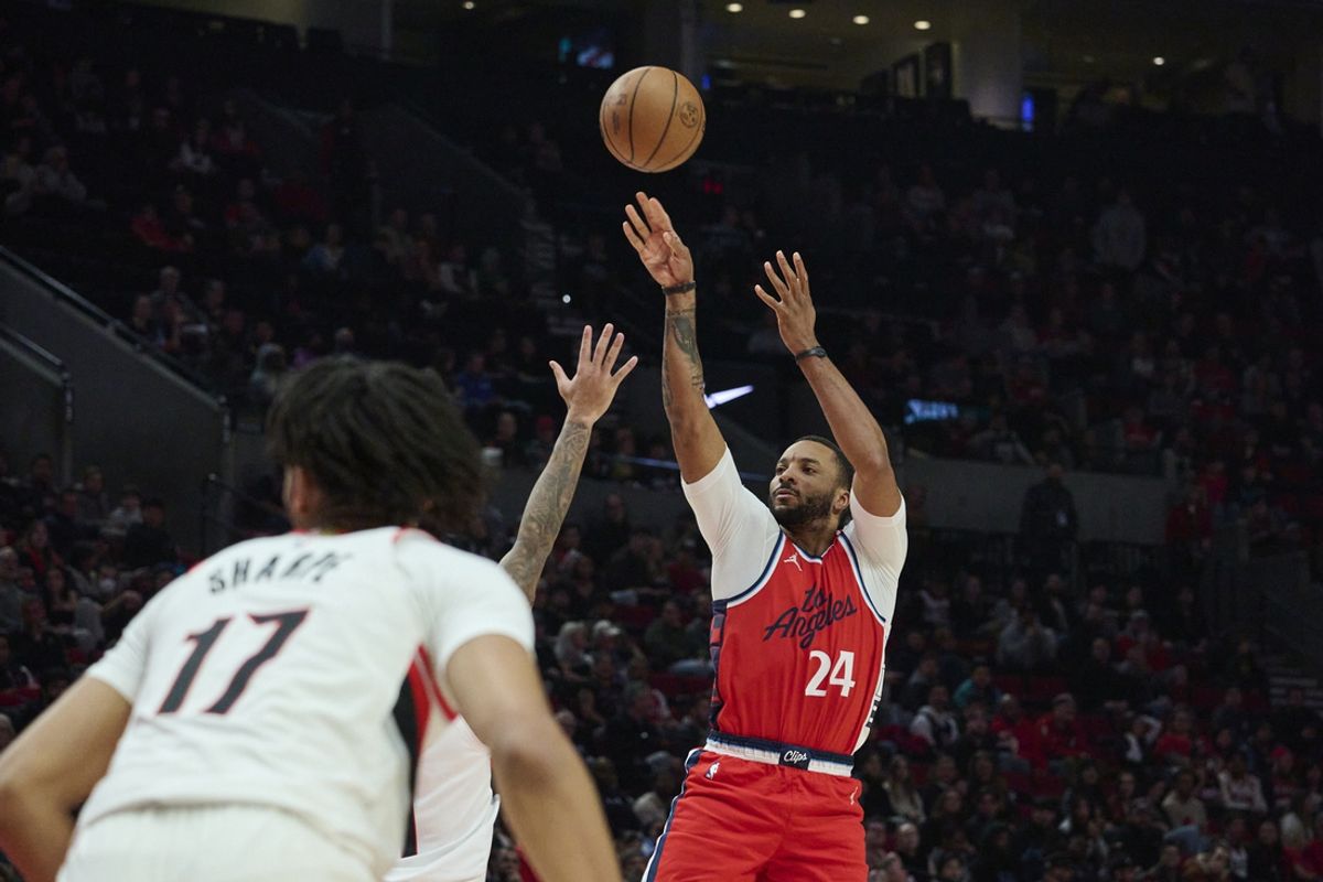 Jan 16, 2025; Portland, Oregon, USA; LA Clippers guard Norman Powell (24) shoots a jump shot during the first half against the Portland Trail Blazers at Moda Center. Mandatory Credit: Troy Wayrynen-Imagn Images