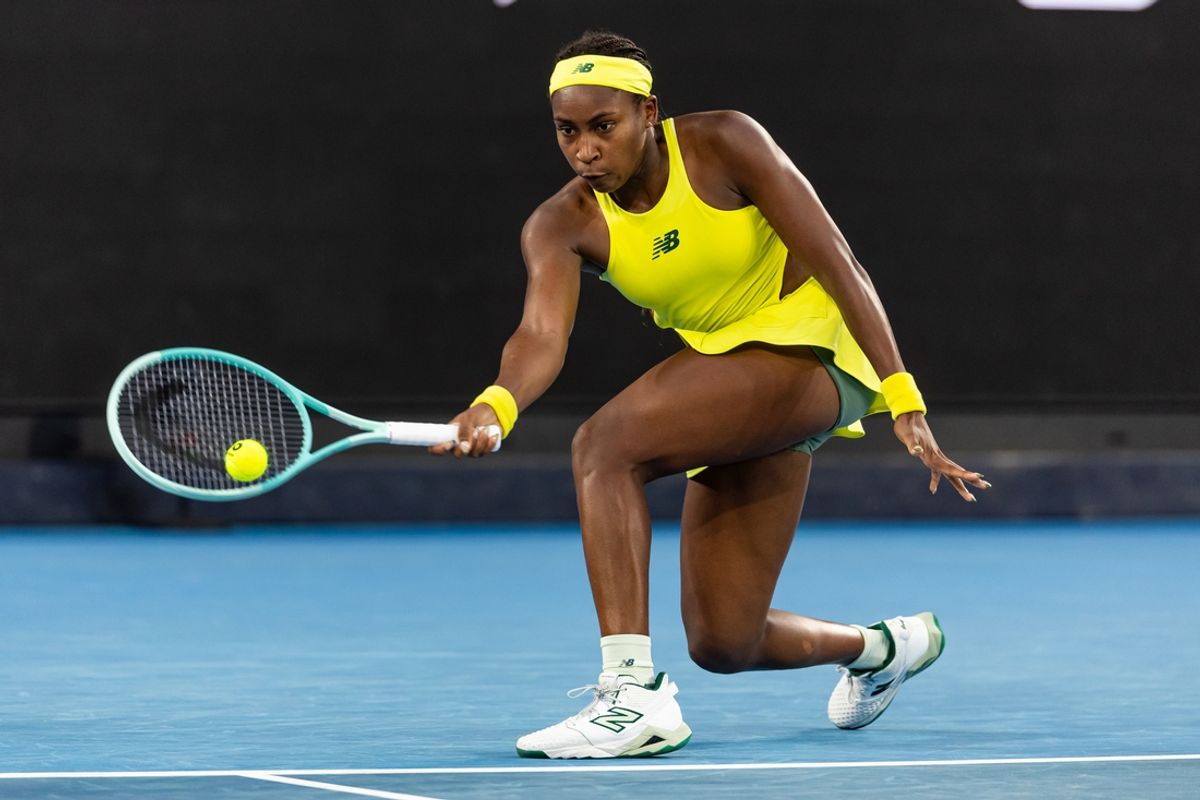 Jan 17, 2025; Melbourne, Victoria, Australia; Coco Gauff of United States of America hits a forehand during her match against Leylah Fernandez of Canada in the third round of the women's singles at the 2025 Australian Open at Melbourne Park. Mandatory Credit: Mike Frey-Imagn Images