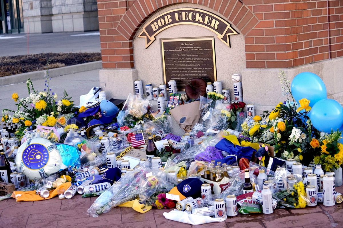 A memorial to honor the death of Bob Uecker at American Family Field at his statue continues to grow on Friday, Jan. 17, 2025. Uecker died yesterday at 90. For 54 seasons he was the voice of the Milwaukee Brewers.