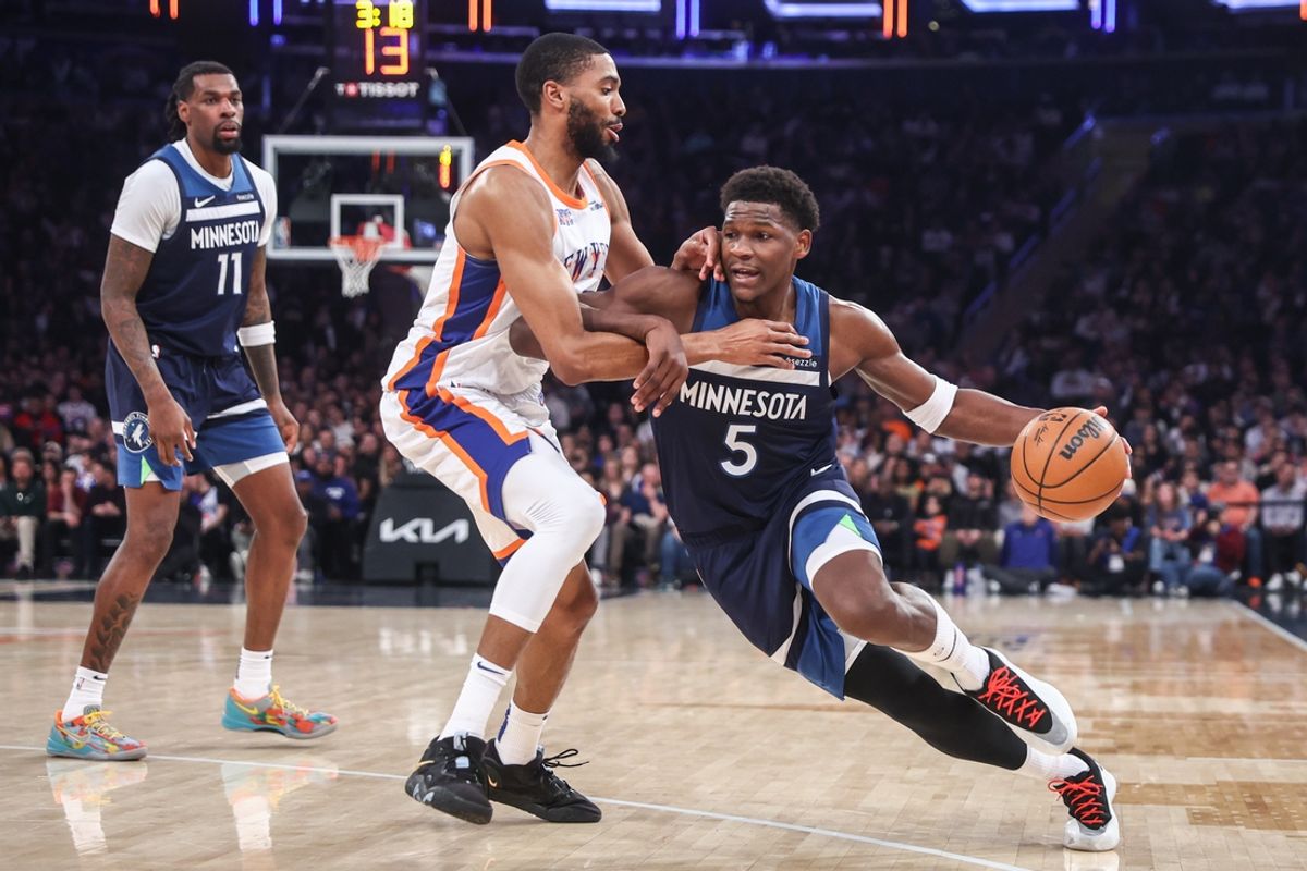 Jan 17, 2025; New York, New York, USA; Minnesota Timberwolves guard Anthony Edwards (5) looks to drive past New York Knicks forward Mikal Bridges (25) in the first quarter at Madison Square Garden. Mandatory Credit: Wendell Cruz-Imagn Images